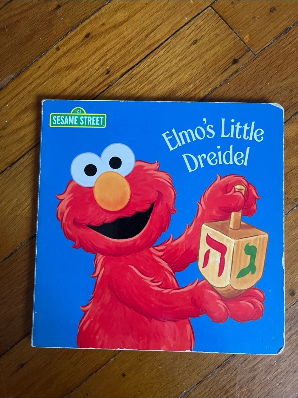Sesame Street Elmo Blue Cover Board Book with Red Elmo